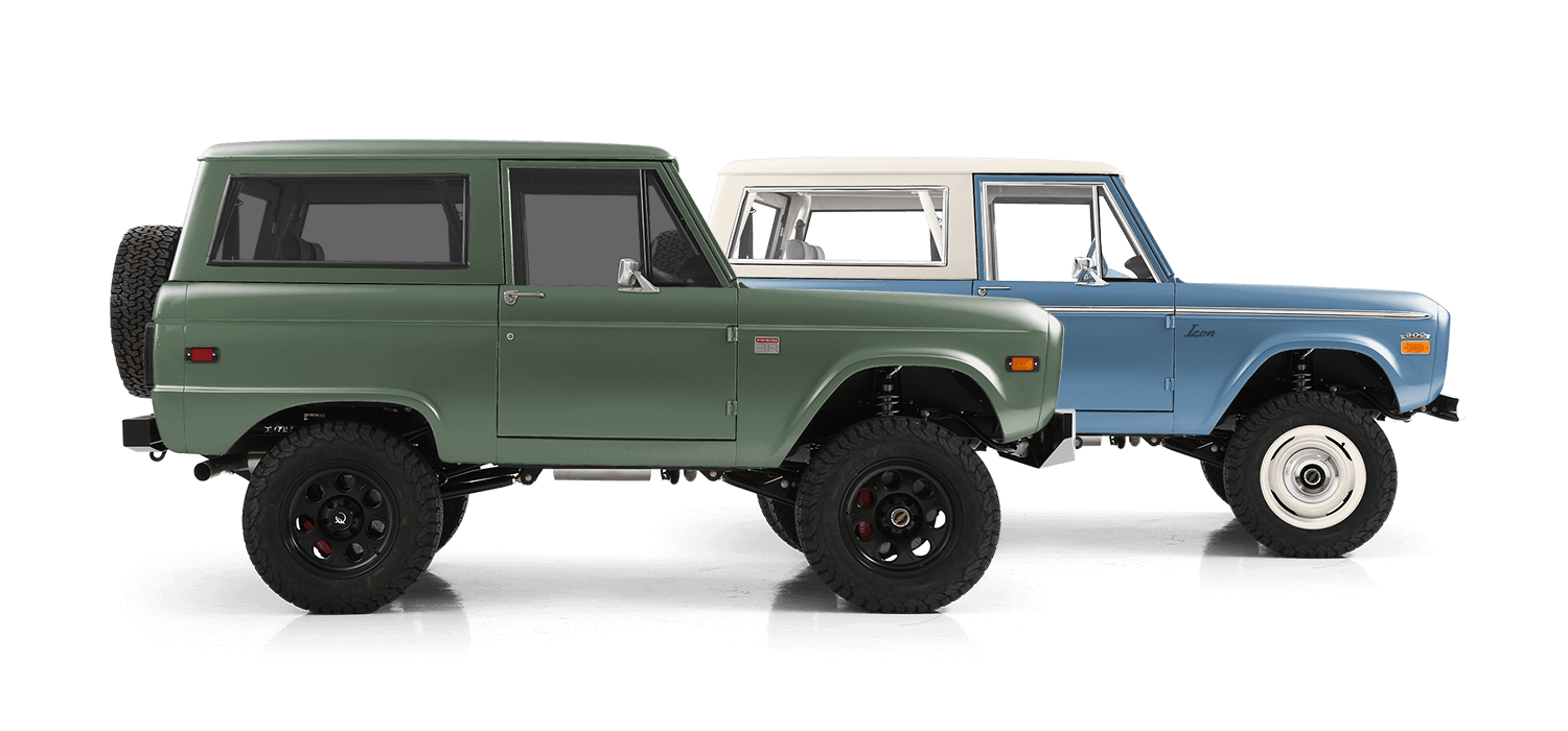 A green ICON bronco in the foreground with a blue one in the background.